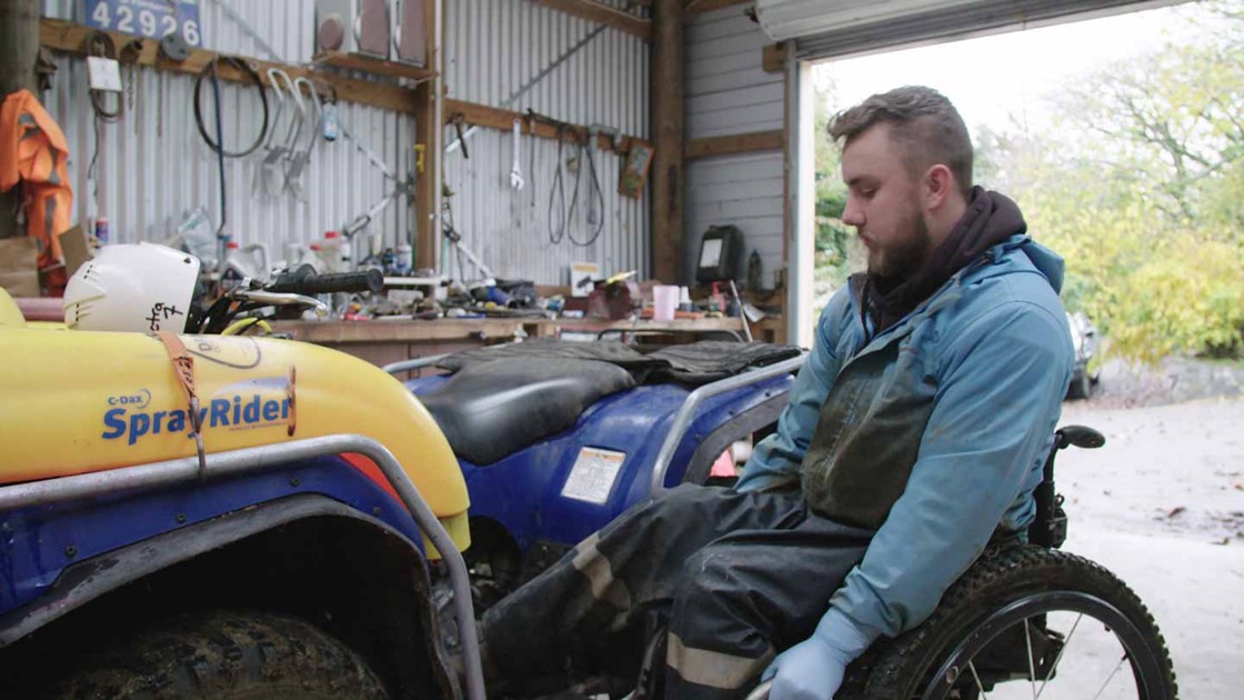 Jack in his shed tending to a quadbike. 